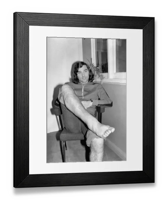 Framed Print : Footballer: George Best. George Best shows his injured legs today