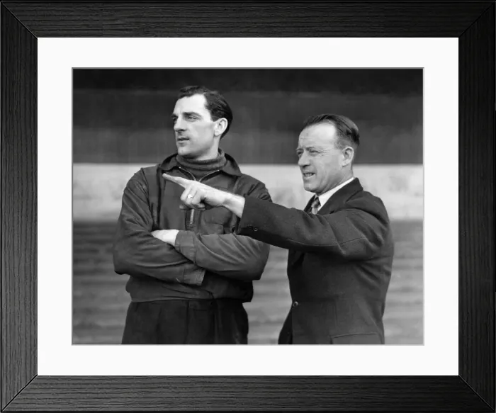 Framed Print : Trainer R. Liddell gives a word of advice to J. McCue the Stock City left-full-back Framed Print : Trainer R. Liddell gives a word of advice to J. McCue the Stock City left-full-back