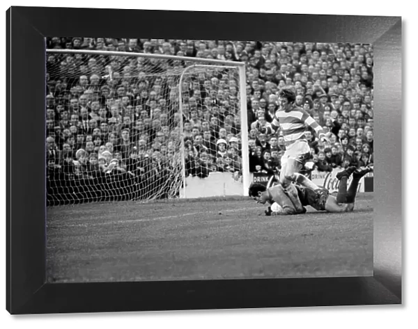 Rodney Marsh, No. 10 of Q. P. R. trys once again to score but he is stopped by Peter