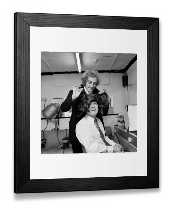 Framed Print : Chelsea football player David Webb opens a wig boutique and hairdresser in London
