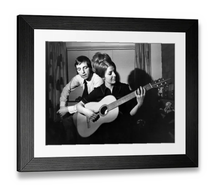 Framed Print : West Bromwich Albions Jeff Astle sings as his wife Laraine plays the guitar at their Framed Print : West Bromwich Albions Jeff Astle sings as his wife Laraine plays the guitar at their