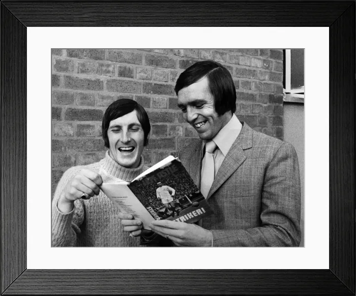 Framed Print : West Bromwich Albion players Jeff Astle and Tony Brown look through Jeff Astle Framed Print : West Bromwich Albion players Jeff Astle and Tony Brown look through Jeff Astle