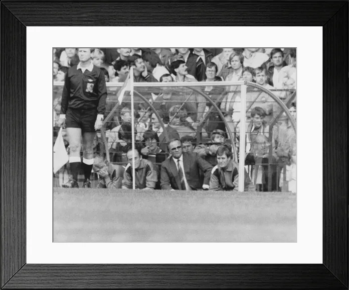 Framed Print : Manchester United manager Ron Atkinson watches from the dug-out Framed Print : Manchester United manager Ron Atkinson watches from the dug-out