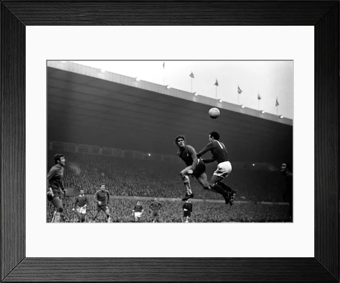 Framed Print : Sport: Football: Manchester United v. Chelsea. David Webb of Chelsea gets a push in
