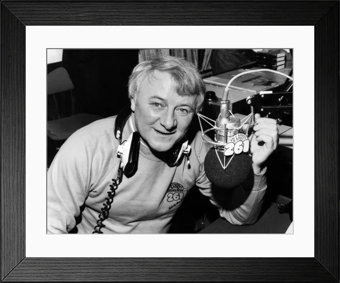Framed Print : On the air'Tommy Docherty jokes with a listener as he hosts a chat show. P011238 Framed Print : On the air'Tommy Docherty jokes with a listener as he hosts a chat show. P011238