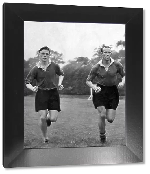 Albert Scanlon (left) and Allenby Chilton of Manchester United in training