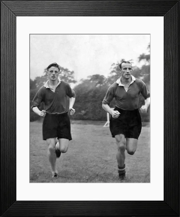 Framed Print : Albert Scanlon (left) and Allenby Chilton of Manchester United in training Framed Print : Albert Scanlon (left) and Allenby Chilton of Manchester United in training
