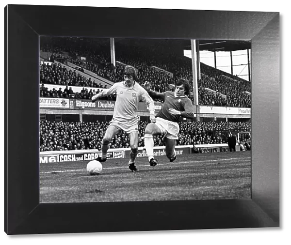 Everton V Leeds. Leeds attack. Allan Clarkes steers the ball past a determined challege