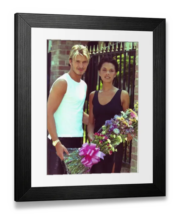Framed Print : Victoria Adams Posh Spiceand David Beckham July 1999 The couple are pictured