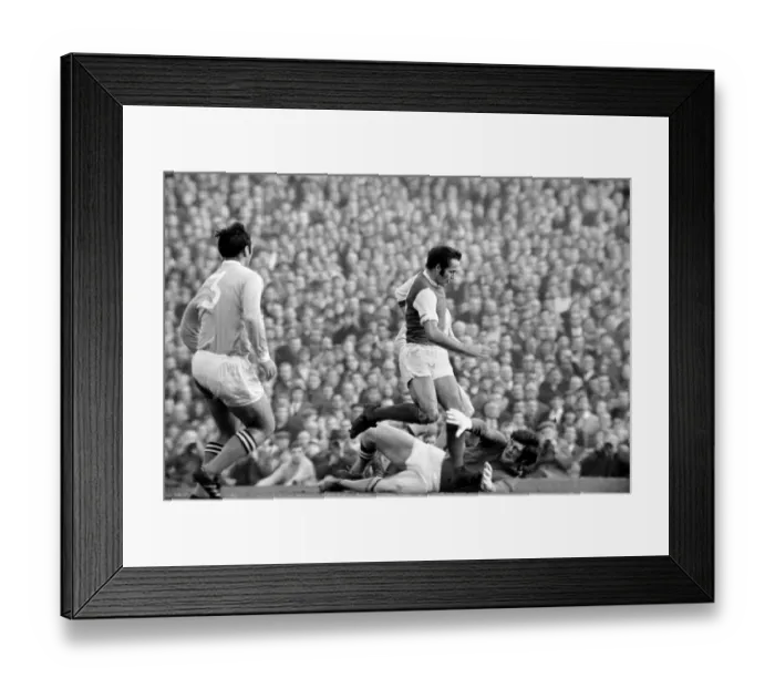 Framed Print : Sport Football. Arsenal vs. Manchester City. Peter Simpson Volleys back to his Goalie Framed Print : Sport Football. Arsenal vs. Manchester City. Peter Simpson Volleys back to his Goalie