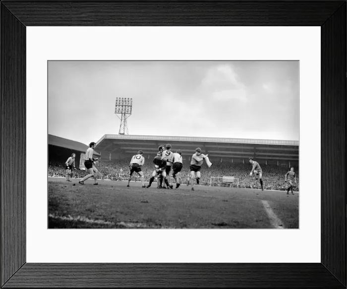 Framed Print : Liverpool v. Wolverhampton Wanderers. Tommy Smith lashes a freekick at the Wolves wall Framed Print : Liverpool v. Wolverhampton Wanderers. Tommy Smith lashes a freekick at the Wolves wall