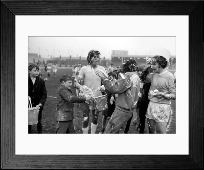 Framed Print : Players covered in soapy water during Charity football match. November 1969 Z11133