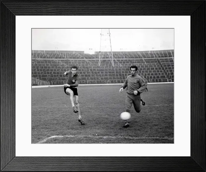 Framed Print : Fiorentina goal getter Aurelio Milani slams a shot at goal during training at Hampden