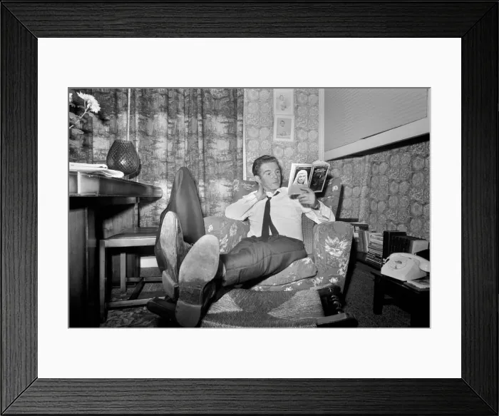Framed Print : Alan Ball the manager of Halifax relaxed at home last night reading a book on famous Framed Print : Alan Ball the manager of Halifax relaxed at home last night reading a book on famous