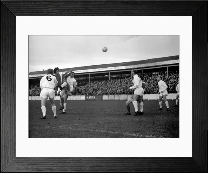 Framed Print : Wigan v Port Vale FA Cup Round One 1969 / 70 Season Wigan forward Savage heads for goals Framed Print : Wigan v Port Vale FA Cup Round One 1969 / 70 Season Wigan forward Savage heads for goals