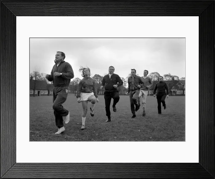 Framed Print : Referees of a local football league in training exercises during a course run for Framed Print : Referees of a local football league in training exercises during a course run for