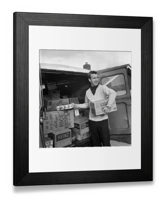 Framed Print : Ex Blackburn and England winger Bryan Douglas loading his grocery van ready for a day Framed Print : Ex Blackburn and England winger Bryan Douglas loading his grocery van ready for a day