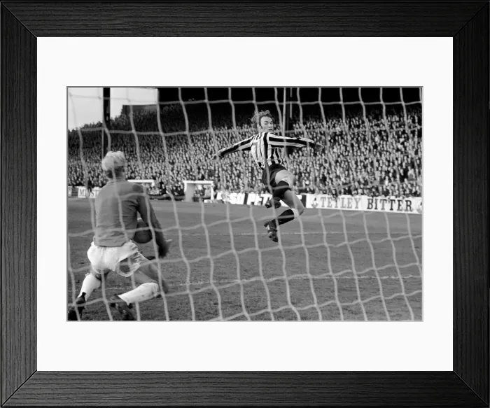 Framed Print : Burnley v. Newcastle. A great effort from Newcastle winger Bryan Robson as he flies Framed Print : Burnley v. Newcastle. A great effort from Newcastle winger Bryan Robson as he flies