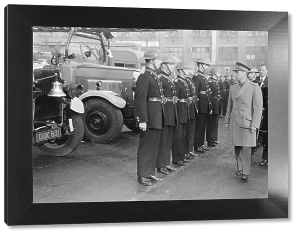 King George VI inspects firemen on his visit to Birmingham after a bombing raid in world