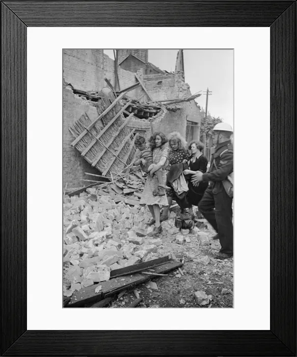 Framed Print : Shock on the faces of a family as they are assisted by an ARP warden after a raid, 1940 Framed Print : Shock on the faces of a family as they are assisted by an ARP warden after a raid, 1940