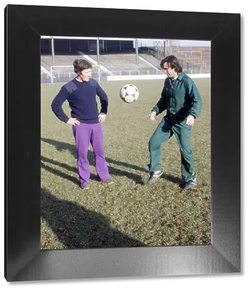 Hibernian footballer George Best practices his ball control watched by coach John Lambie