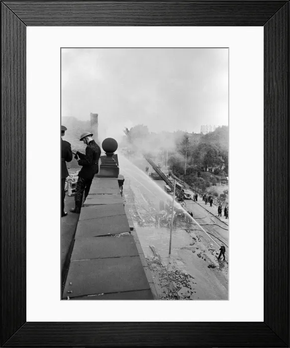 Framed Print : Firemen and Civil defence teams at work