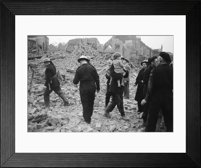 Framed Print : Firemen rescue young children after daylight raid, Circa 1940 Framed Print : Firemen rescue young children after daylight raid, Circa 1940
