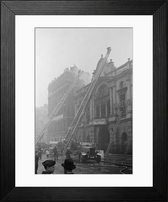 Framed Print : Woodbine bomb damage, Taylors depository, London, 3rd February 1941