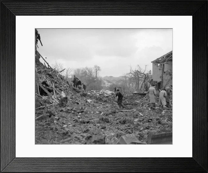 Framed Print : Air Raid Damage in Bristol Civilians searching through rubble of their bomb damaged Framed Print : Air Raid Damage in Bristol Civilians searching through rubble of their bomb damaged