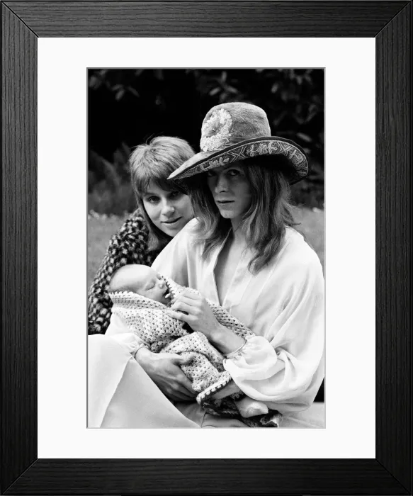 Framed Print : Pop star David Bowie with wife Angie and three week old son Zowie Framed Print : Pop star David Bowie with wife Angie and three week old son Zowie