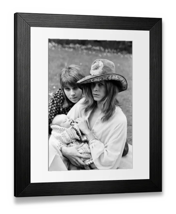 Framed Print : Pop star David Bowie with wife Angie and three week old son Zowie