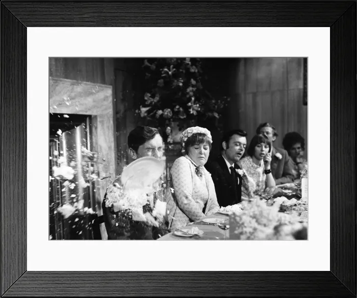 Framed Print : Filming Carry on Loving at Pinewood Studios. Kenneth Williams sitting