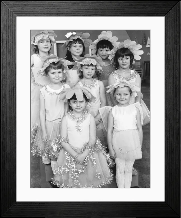 Framed Print : Manchester school children dressed as snowflakes for their schools pantomime Framed Print : Manchester school children dressed as snowflakes for their schools pantomime