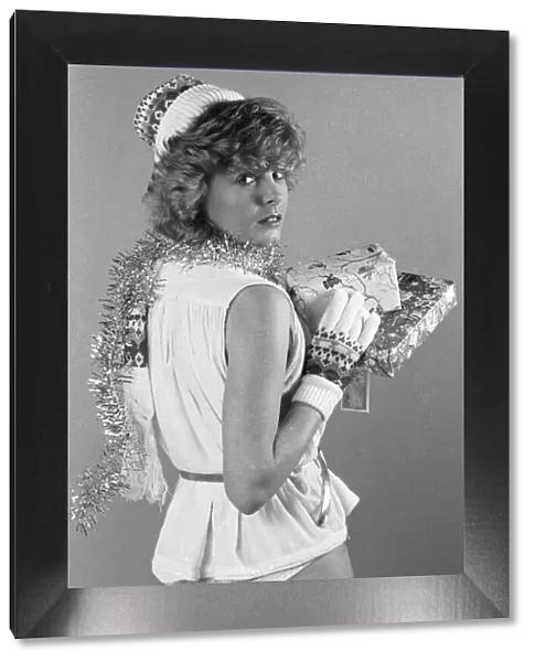Model seen here in the MEN studios posing for Christmas gifts feature December 1982
