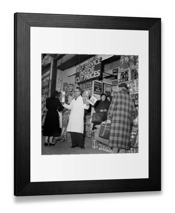 Framed Print : Supermarket Shopping March 1958 Shopkeeper promoting his products to customers Framed Print : Supermarket Shopping March 1958 Shopkeeper promoting his products to customers