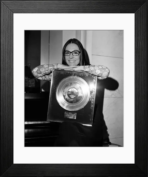 Framed Print : Nana Mouskouri, International Singing Star, is presented with a gold disc for her LP