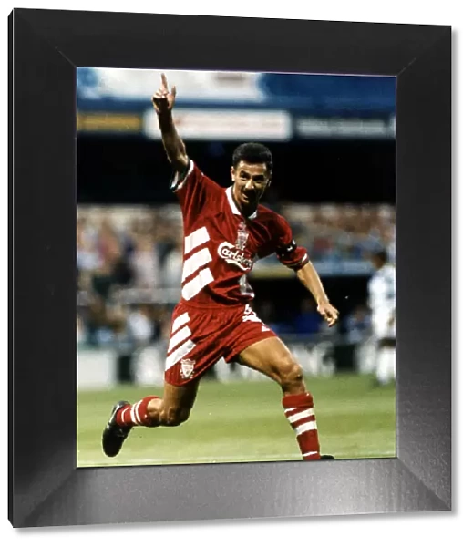 Liverpool footballer Ian Rush celebrates after scoring a goal against QPR during