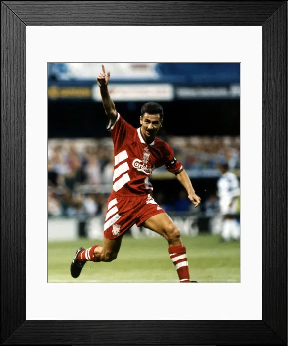 Framed Print : Liverpool footballer Ian Rush celebrates after scoring a goal against QPR during Framed Print : Liverpool footballer Ian Rush celebrates after scoring a goal against QPR during