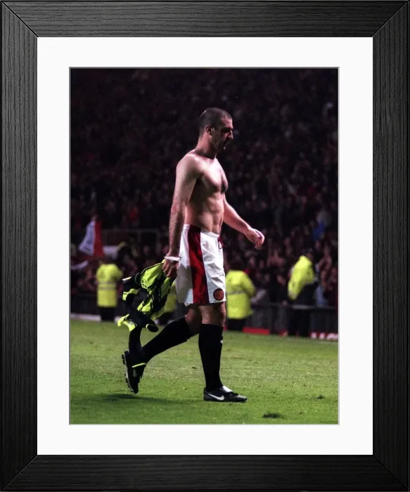 Framed Print : Eric Cantona Manchester United Football Player walks off the pitch topless dejected after Framed Print : Eric Cantona Manchester United Football Player walks off the pitch topless dejected after