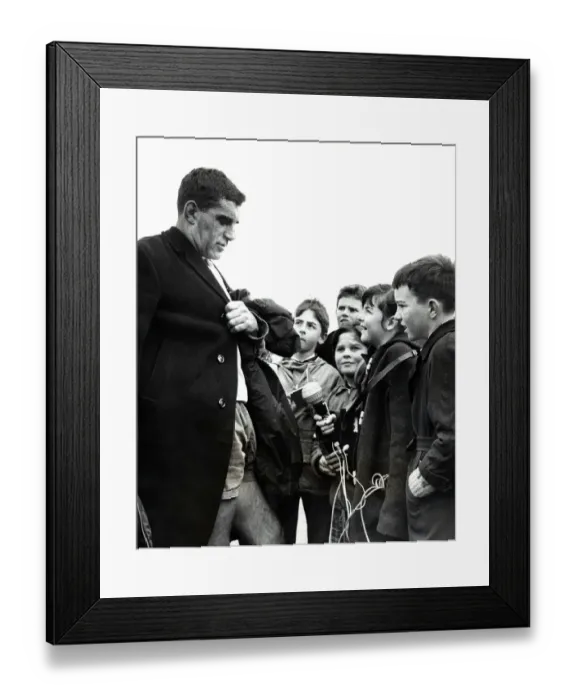 Framed Print : Colin Meads, New Zealand rugby player was interviewed by local schoolgirl Angela Hounsell