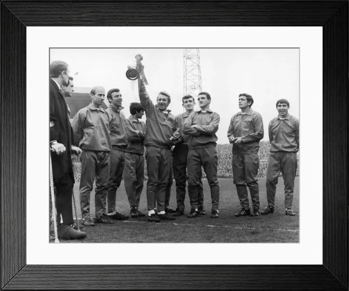Framed Print : Dennis Law holds the division one championship trophy at Old Trafford with his fellow Framed Print : Dennis Law holds the division one championship trophy at Old Trafford with his fellow