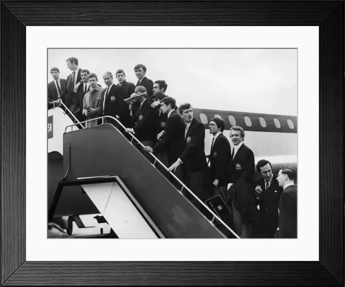 Framed Print : Manchester United seen here boarding a plane at Manchester Ringway airport for their Framed Print : Manchester United seen here boarding a plane at Manchester Ringway airport for their
