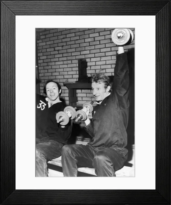 Framed Print : Manchester United stars Nobby Stiles (left) and Denis Law seen here in training Framed Print : Manchester United stars Nobby Stiles (left) and Denis Law seen here in training