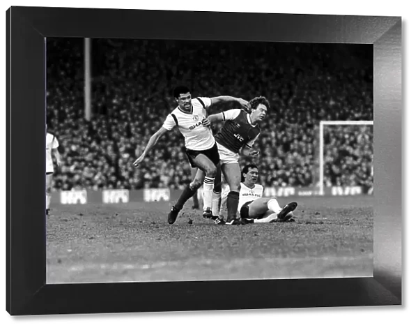 Paul McGrath of Manchester United challenges Tony Woodcock of Arsenal during the clash at