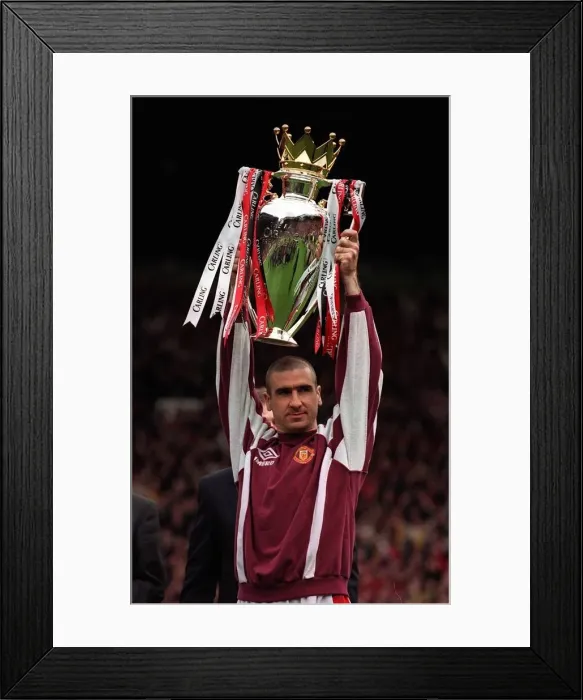 Framed Print : Eric Cantona Manchester United manager celebrates after winning the Premier League title