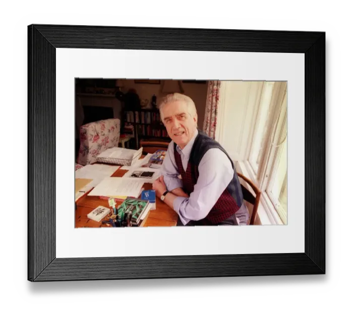 Framed Print : JOHNNY BEATTIE AT HOME sitting at desk Framed Print : JOHNNY BEATTIE AT HOME sitting at desk