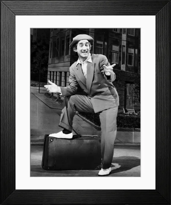 Framed Print : Johnny Beattie comedian comic actor on stage foot on suit case pointing back drop Framed Print : Johnny Beattie comedian comic actor on stage foot on suit case pointing back drop