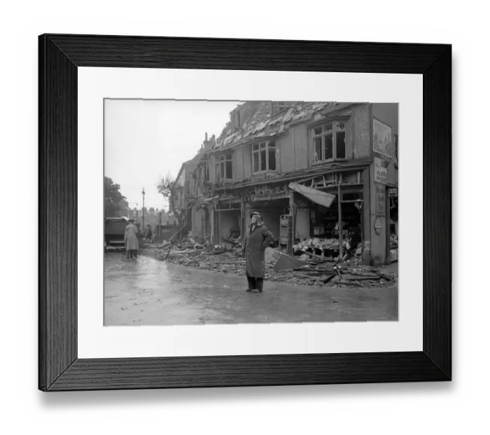 Framed Print : WW2 Air Raid Damage Air raid damage at Bridlington A fireman stands in Framed Print : WW2 Air Raid Damage Air raid damage at Bridlington A fireman stands in
