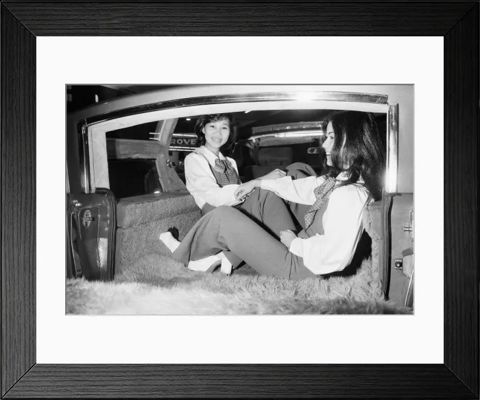 Framed Print : Models sitting in a fur lined estate car at the 1973 Geneva Motor Show Framed Print : Models sitting in a fur lined estate car at the 1973 Geneva Motor Show