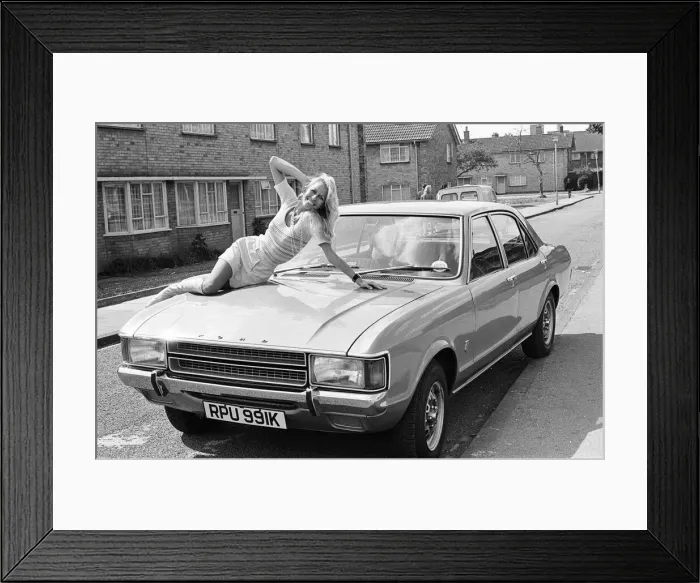 Framed Print : Reveille model Andrea Lloyd seen here posing with a Ford Consul which is top prize in Framed Print : Reveille model Andrea Lloyd seen here posing with a Ford Consul which is top prize in